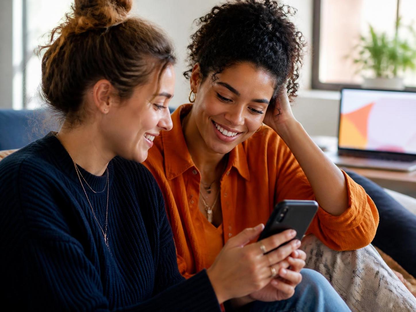 Friends sharing a shopping recommendation on a smartphone